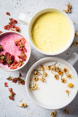 Different types of moon milk: rose flower, golden turmeric and chamomile. Ayurveda drink, healthy lifestyle, remedy for insomnia.