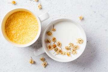 Chamomile moon milk and golden turmeric milk. Ayurveda drink, healthy food, remedy for insomnia.