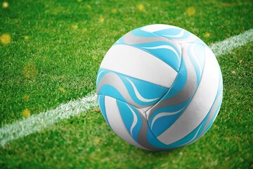 Classic Football Ball on green grass at stadium