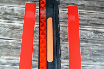 A warning foldaway reflective road hazard warning triangle and a pair of car phosphorescent...