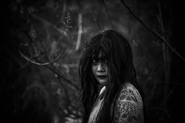 Portrait of asian woman make up ghost face at the swamp,Horror in water scene,Scary at...