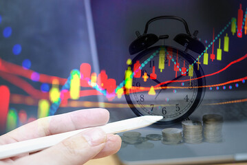 Financial data of stock market in term of a digital prices on LED display. A number of daily market price and quotation of prices chart to represent candle stick tracking in Forex trading.
