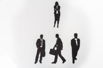 Businessman icon set isolated on white. Silhouettes of businessmen and businesswoman.