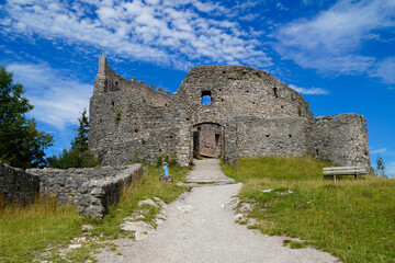 Ancient ruins of Eisenberg Castle or Burg Hohenfreyberg against the blue sky, Allgaeu, Bavaria, Germany