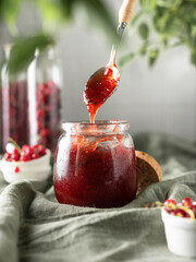 jam made from red berries. home preservation. strawberry and red currant jam