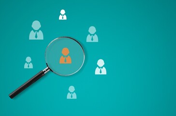 Magnifier glass on icon of human group leader  concept.