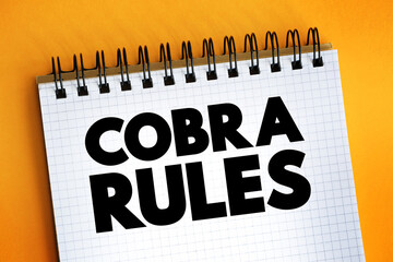 Cobra Rules text on notepad, concept background