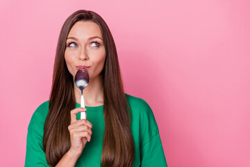 Portrait of gorgeous nice cute girl with straight hairstyle holding spoon lips looking empty space...