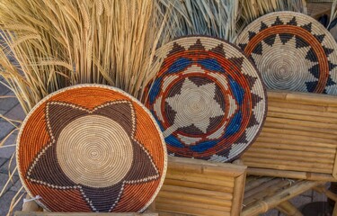 Colourful handmade wicker plates and rattan material at Ibiza, Balearic islands, Spain