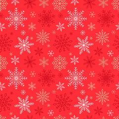 Snowflakes seamless pattern of many snowflakes on a red background.