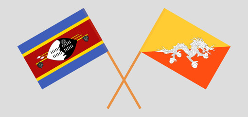 Crossed flags of Eswatini and Bhutan. Official colors. Correct proportion