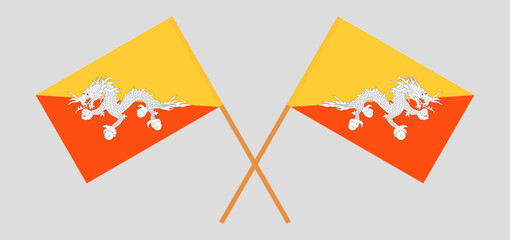 Crossed flags of Bhutan. Official colors. Correct proportion