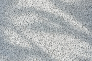 The shadow of the sun shining through the wood