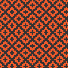 Black cross-stitch knitting pattern on orange background. Black square dots on orange backdrop. Fabric pattern design for sale. Knitting handicraft art.