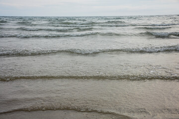 sand on the beach is natural for the background