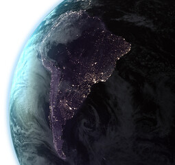 Image of planet earth with change from day to night and illuminated city lights of brazil