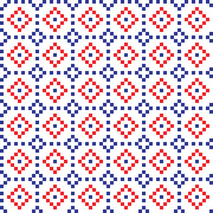 Red and blue cross-stitch knitting pattern on white background. Red and blue square dots on white backdrop. Fabric pattern design for sale. Knitting handicraft art.