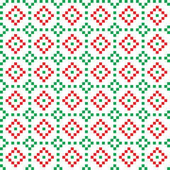 Fototapeta na wymiar Red and green cross-stitch knitting pattern on white background. Red and green cloth pattern on white backdrop. Christmas color theme fabric pattern design for sale. Knitting handicraft art.