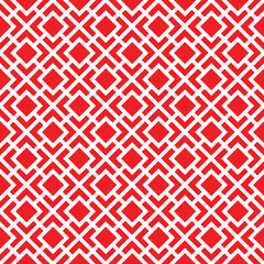White interlaced pattern on red background. White interlocking pattern on red backdrop.