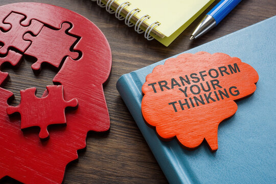 Transform your thinking sign on the brain and puzzle.