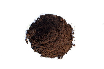 A pile of soil for seedlings lies on a white background.