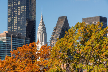 New York City skyline in Fall. Midtown Manhattan with landmark skyscrapers from Upper East Side