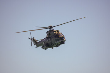 Flying military helicopter © bizoo_n