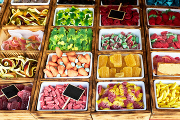 Variety of jelly beans and candies in a store. Sweet food. Unhealthy concept