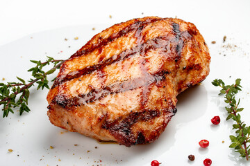 Grilled chicken breast on white background