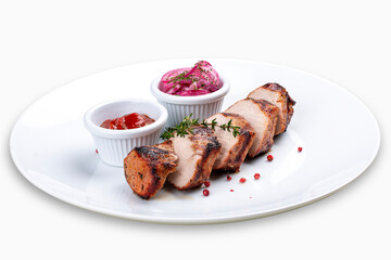 Grilled pork sliced with tomato sauce and pickled onions. Isolated on a white background