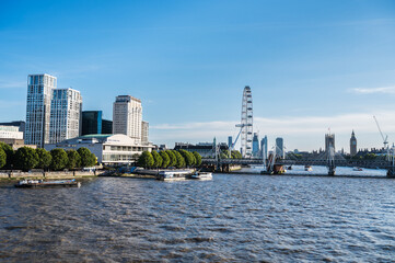 View of London Eye from Waterloo bridge. Westminster Palace view