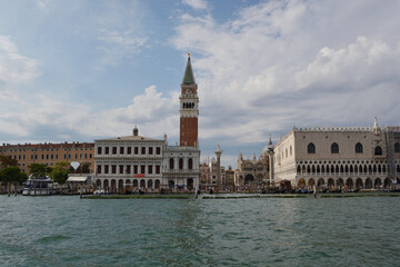 Fototapeta na wymiar Venice island with the historic buildings the bell tower of San Marco seen from the sea without people