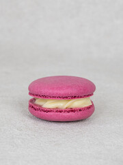 pink macaron with curdled white cream