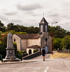 Pilgrim near the Church of Saint-Pierre, Argagnon