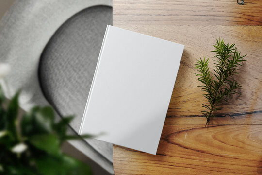 Clean Minimal Book 4x6 Mockup On Top Wooden Table With Conifer And Leaves