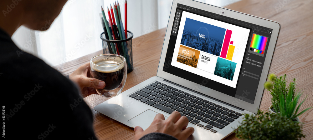 Fototapete graphic designer software for modern design of web page and commercial ads showing on the computer s