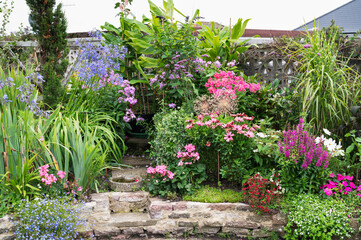 Beautiful potted flowers arrangements in the garden