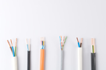 Electric cables, many copper wires with colored isolation isolated on white background