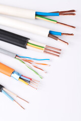 Electric cables, many copper wires with colored isolation isolated on white background