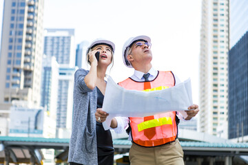 Engineers describe details of project to customer.