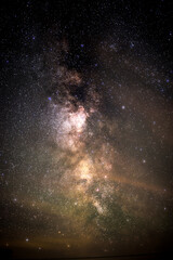 The Milky Way galaxy landscape and starry sky at night in autumn (summer) in the countryside (country, village)