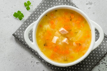 Vegetable split pea soup puree in bowl. Top view, copy space, flat lay.