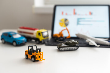 Tablet, a set of toy vehicles