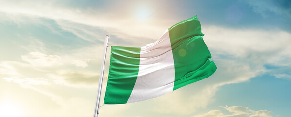 Nigeria national flag cloth fabric waving on the sky - Image - obrazy, fototapety, plakaty