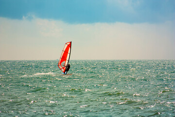 skiing windsurfing in the ocean waves
