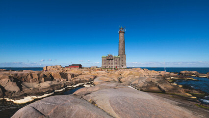 Bengtskär Lighthouse, summer view of Bengtskar island in Archipelago Sea, Finland, Kimitoön, Gulf of Finland sunny day