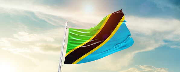 Tanzania national flag cloth fabric waving on the sky - Image - obrazy, fototapety, plakaty