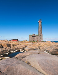 Bengtskär Lighthouse, summer view of Bengtskar island in Archipelago Sea, Finland, Kimitoön, Gulf of Finland sunny day