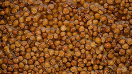 Lentils in water top view. Ingredient for healthy salad