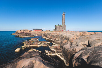 Bengtsk&auml;r Lighthouse, summer view of Bengtskar island in Archipelago Sea, Finland, Kimito&ouml;n, Gulf of Finland sunny day